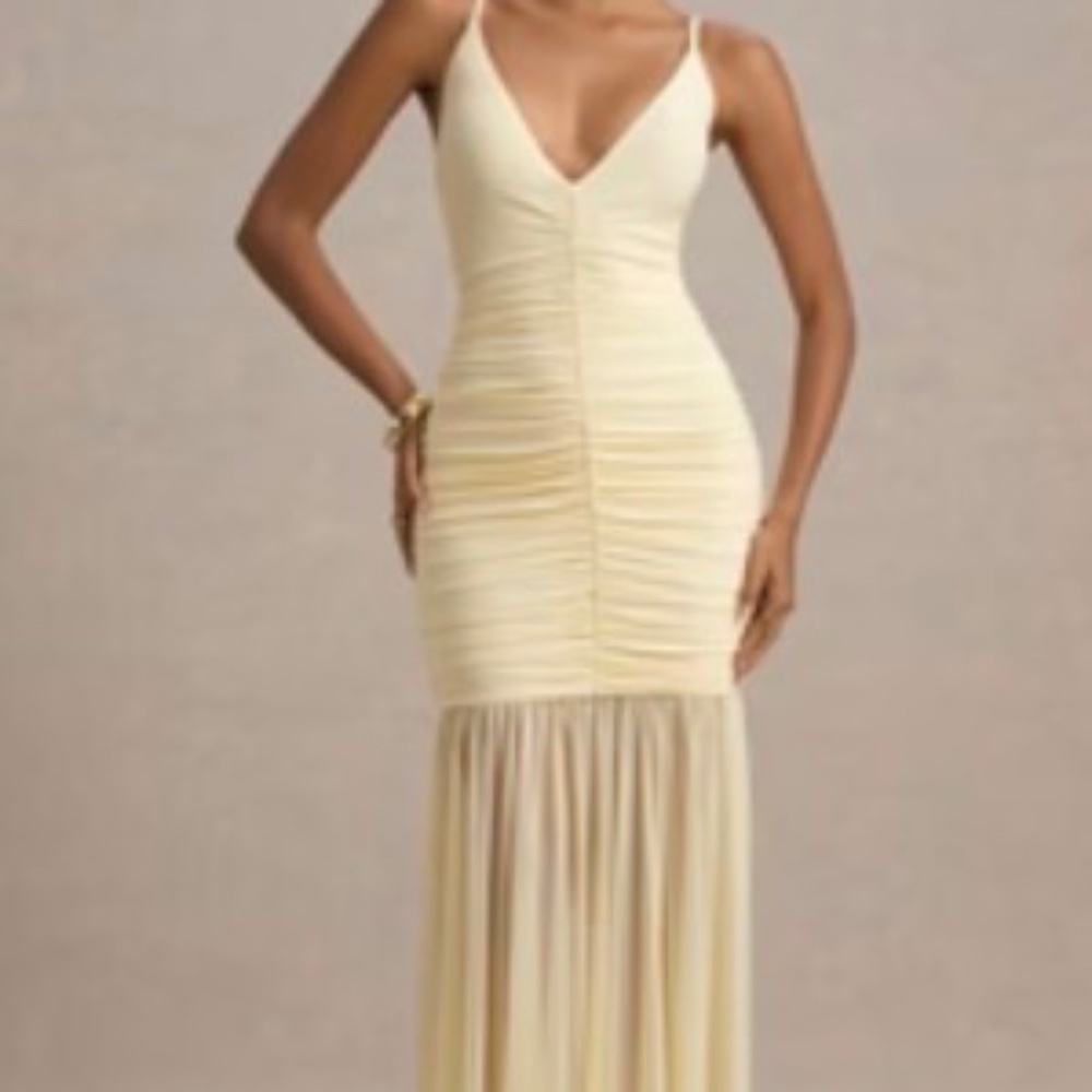 Club London  yellow dress.